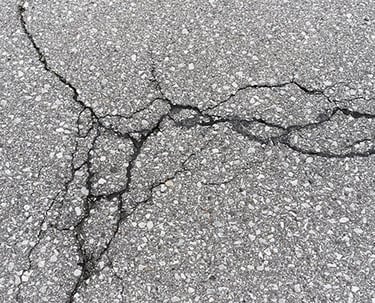 Example of asphalt crack that needs repair