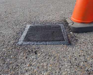 Pothole repair with sealed edges