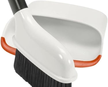 a broom and a brush on a white background