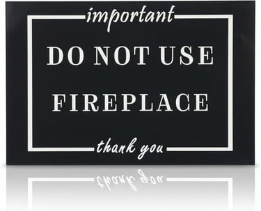 Black and white safety sign stating important do not use fireplace thank you