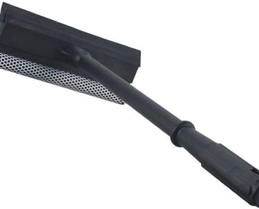 a black and white cleaning brush with a black handle