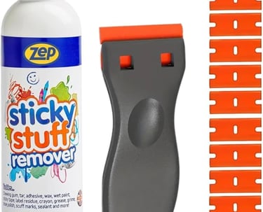 Zep Sticky Stuff Remover bottle with a plastic scraper tool and replacement blades.