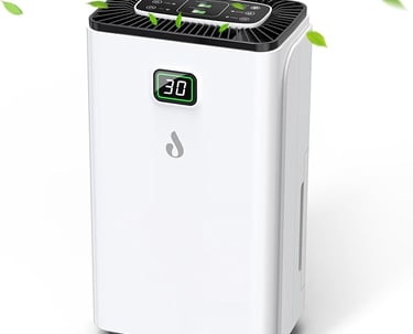 a white air conditioner with a green leafy design