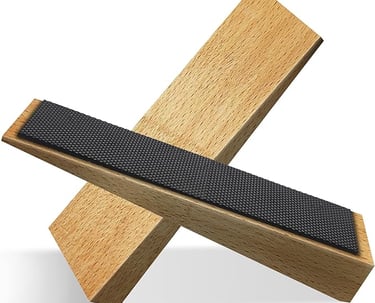 a pair of scissors and a knife sharpe sharpe sharper