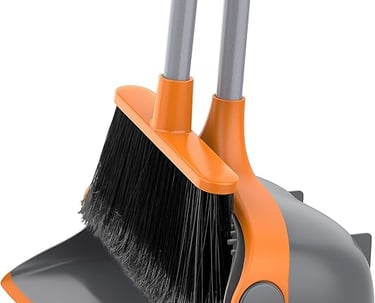 Orange and grey broom and dustpan set with long handles for upright floor cleaning.