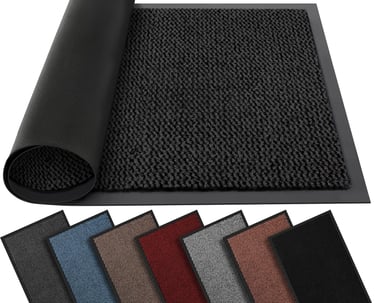 a mat mat with a roll of carpeting and a roll of carpet