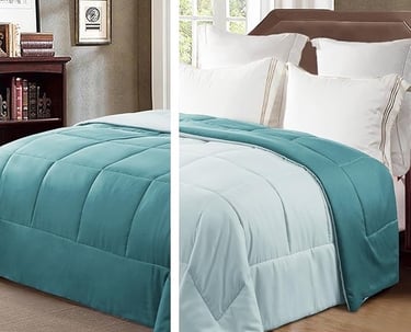 a bed with a blue comforter and a white bed