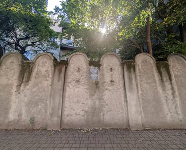 Brick wall with inscriptions and names, part of the Jewish wall in Krakow.