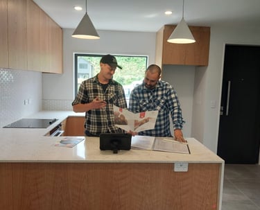 Terence and Denym in a kitchen