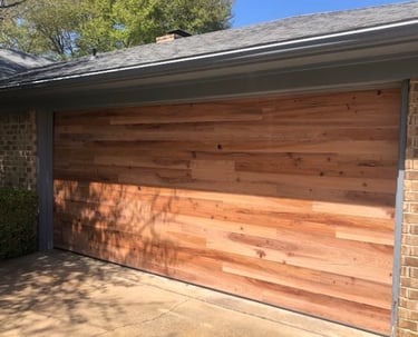 16x7 steel back cypress plank door installed Longview tx