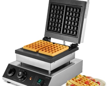 Professional commercial waffle maker with non-stick plates baking two golden Belgian waffles.