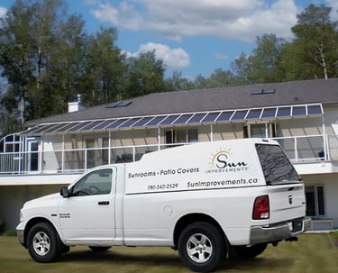 Sun Improvements vehicle in front of a patio cover.