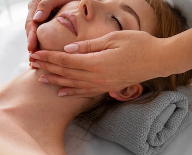a woman getting a facial massage