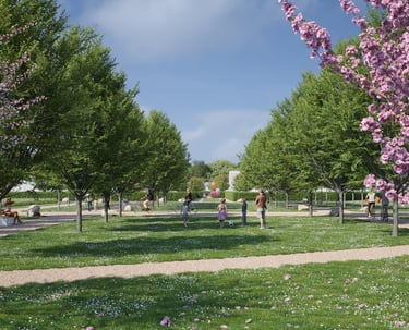 Aménagement paysager du lotissement Domaine du Parc à Belbeuf avec allée piétonne et arbres en fleur