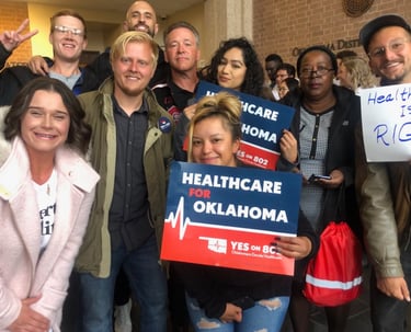Ray Jarosz poses with some of his crew at the Oklahoma Secretary of State's Office.