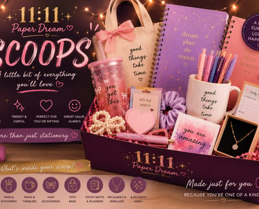 Gift box filled with pink and purple stationery including notebooks, a mug, pens, and a tumbler.