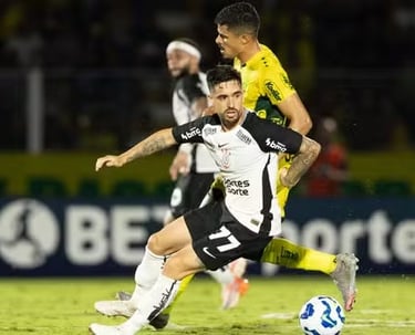 a soccer player is playing soccer on a field