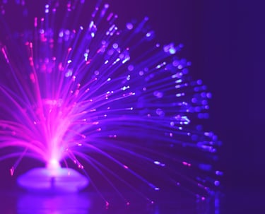 a purple fiber optic light lit up with purple lights