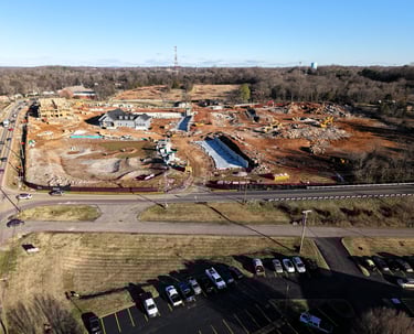 High-resolution aerial site documentation of a multi-family apartment complex under construction in 