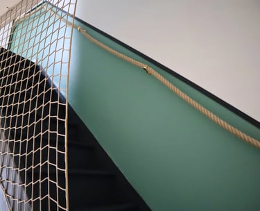 Stylish staircase with modern railing, corporate accommodation