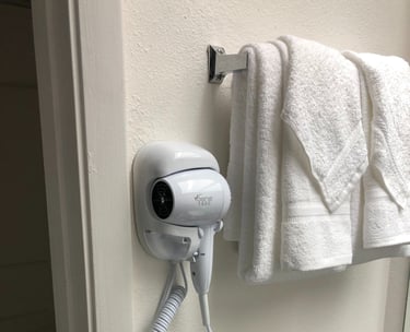 a hair dryer is shown in a bathroom