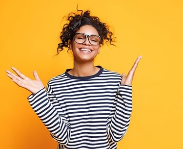a smiling woman with glasses and a striped shirt