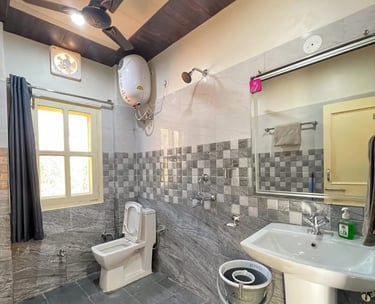bathroom at Green Acres Homestay