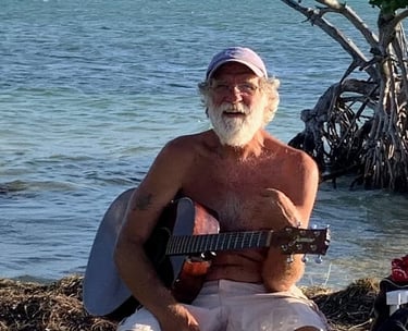 a man with a guitar and a guitar