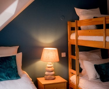 Les lits de la chambre mésange de la Ferme du Veyre