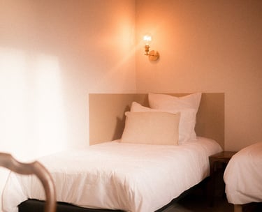 Lits de la chambre hirondelle de la Ferme du Veyre