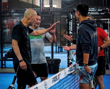 Group of players showing sportsmanship after a padel match