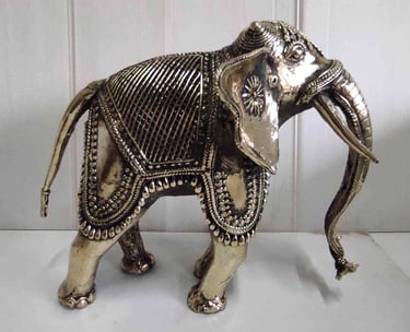 "Handcrafted brass elephant with artistic tribal design, right view-for overseas markets"