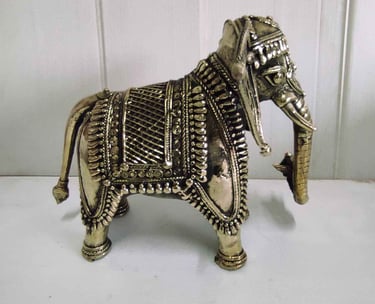 "Handcrafted angry baby elephant featuring floral tribal motifs-for foreign trade"