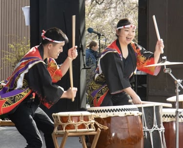 the Mark H Taiko Connection performs on stage