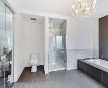 a bathroom with a chandelier