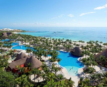 5-star all-inclusive Barceló Maya Colonial resort in Mexico, featuring white sandy beach