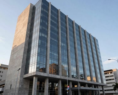 An architectural shot of a modern courthouse in a South American city, glass and concrete design under a clear sky, highlighting transparency and justice.