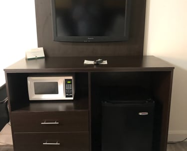 a microwave and a refrigerator in a room