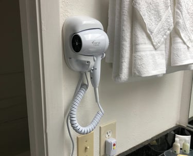 a hair dryer is shown in a bathroom
