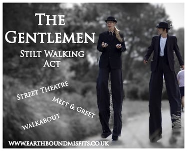 The Gentlemen stilt walking act performers in black suits for street theatre and events.