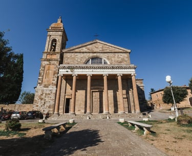 a church with a large stone building with a clock tower