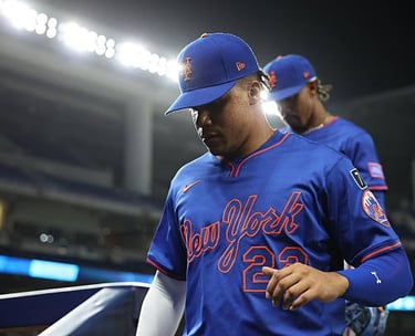 April 1 NY Mets Juan Soto (22) and Francisco Lindor enter the dugout in between innings during a game vs. Marlins