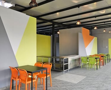 Modern dining room with veg food and comfortable seating