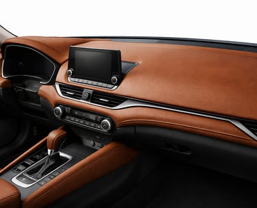 Premium leather dashboard and console covers fitted to enhance car interior appearance.