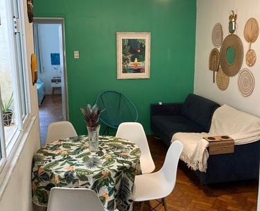 a dining room table with a table and chairs