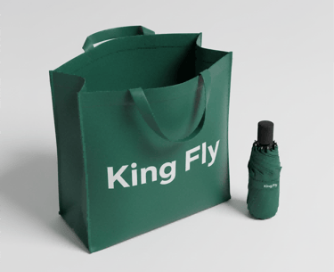 King Fly Event Swag: Green Tote Bag & Compact Umbrella.