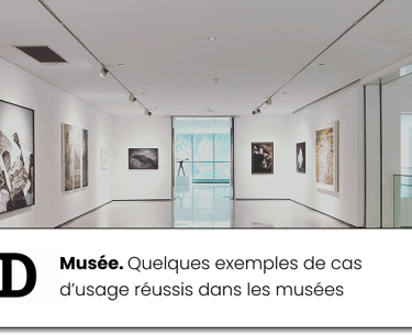 a museum with a large number of paintings on display