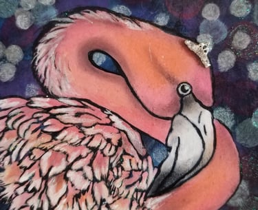 Pink Flamingo wearing a crown, lights behind her.