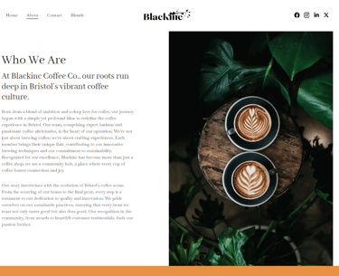 Top down view of two latte art coffees on a rustic wooden table by Blackinc Coffee Co in Bristol.