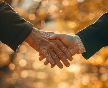 Poignée de mains symbolisant confiance et soutien pour un service de ménage aidé à domicile